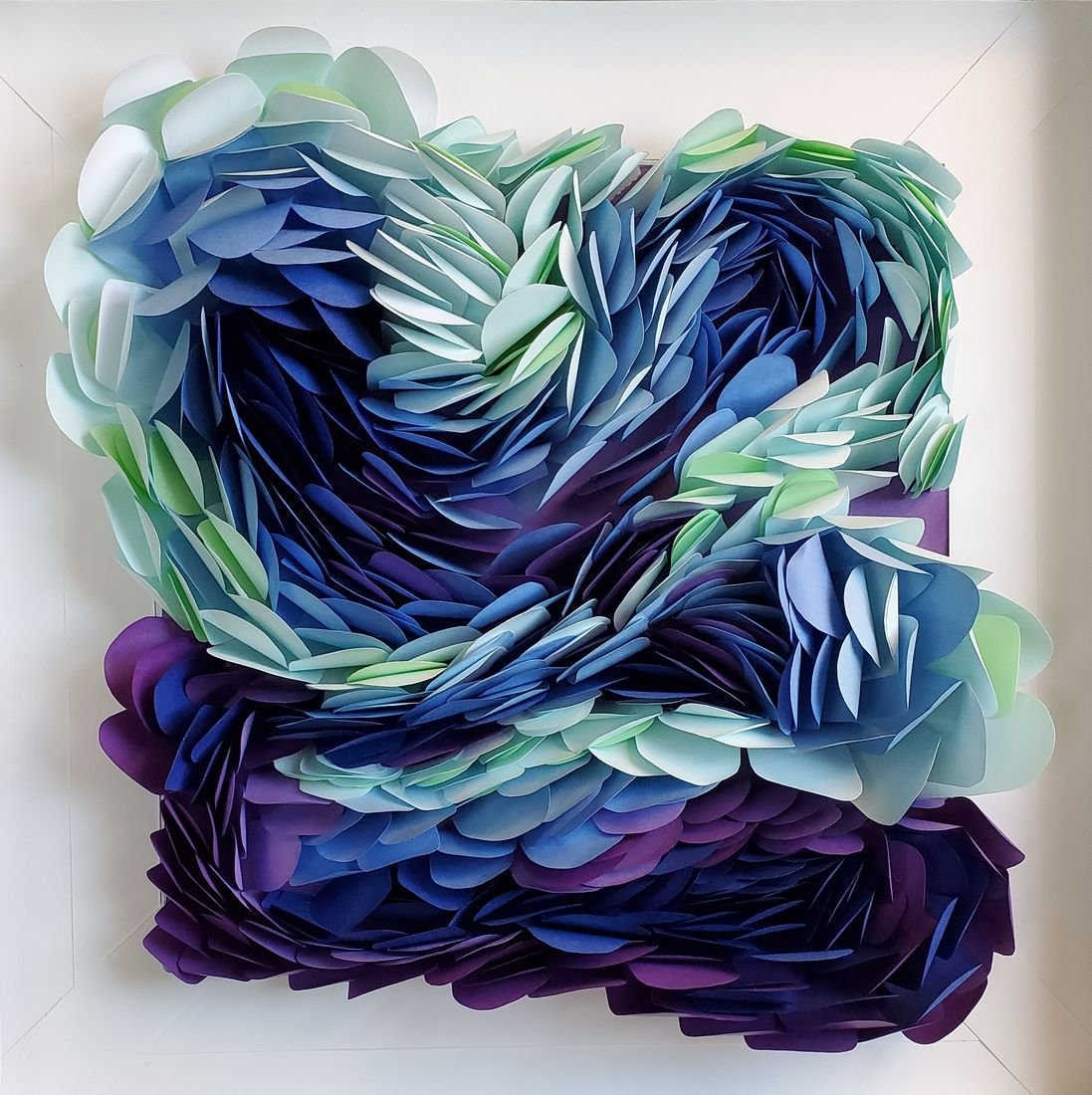 Labyrinth of Periwinkle Hope: overlapping paper petals in blue, purple and mint green forming a rolling wave
